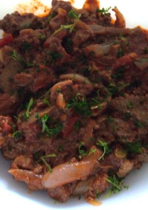Una foto de Higaditos de pollo encebollados