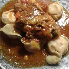 Foto principal de Agnelottis caseros con tuco clásico de pollo