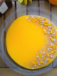 Una foto de Cheesecake de vainilla, naranja y licor cointreau