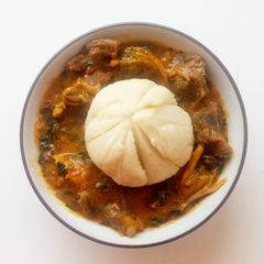 A picture of Ogbono soup with fufu.