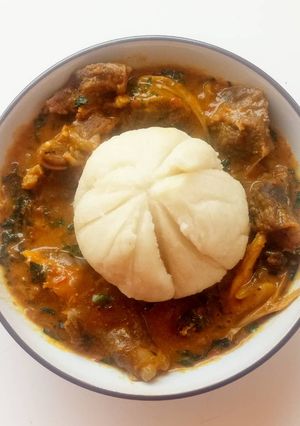 A picture of Ogbono soup with fufu.