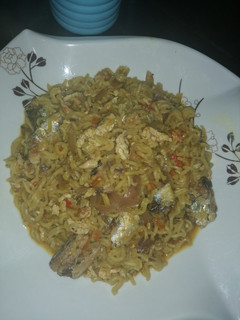 A picture of Cooked indomie with sardines and scrambled egg.