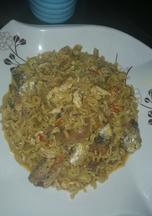 A picture of Cooked indomie with sardines and scrambled egg.