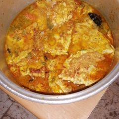 Egg Omlate with Tomato Curry A picture of Egg Omlate with Tomato Curry.