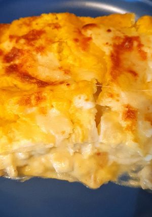 A picture of Lasagna with pumpkin and sausage.
