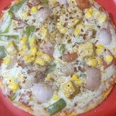 A picture of Corn paneer pizza.