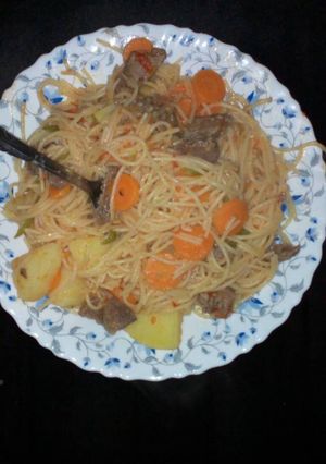 A picture of Spaghetti stirred in potato beef.