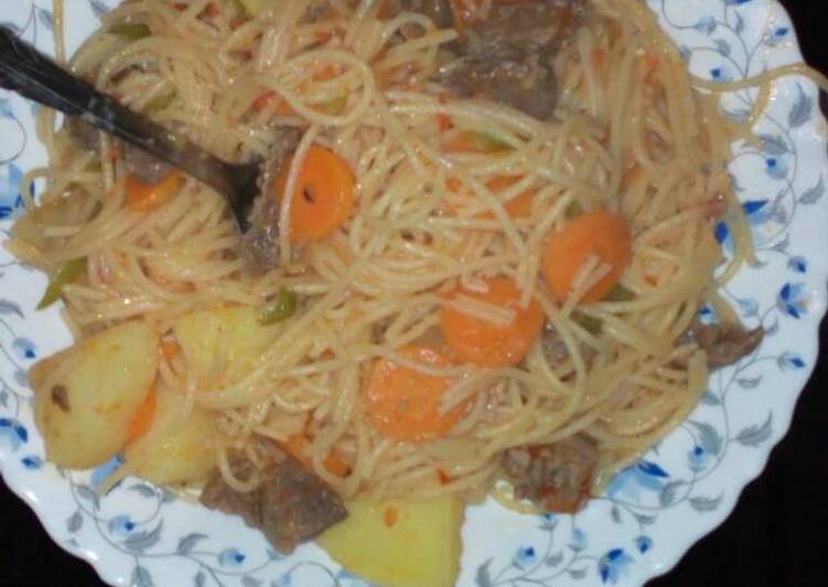 Spaghetti stirred in potato beef