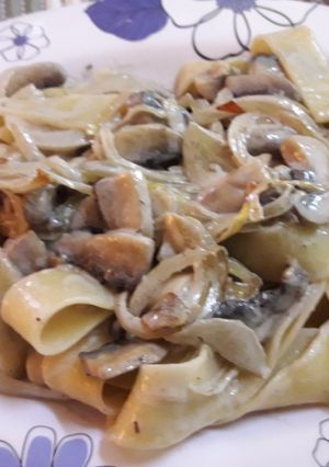 Una foto de Papardelle con champiñón a la crema