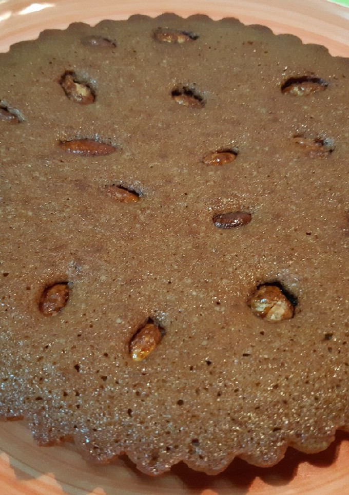 Una foto de Bizcocho casero de chocolate y almendras garrapiñadas