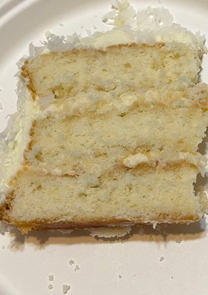 A picture of Coconut Cake w/ Cream Cheese Frosting.