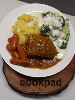 A picture of Chicken curry with creamy broccoli and mash potato.