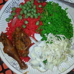 Multi coloured jelouf rice and chicken pepper A picture of Multi coloured jelouf rice and chicken pepper.