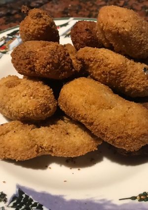 Una foto de Nuggets de pollo y queso