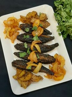 आलू भरे करेले(aloo bhare karele recipe in hindi) रेसिपी मुख्य फोटो
