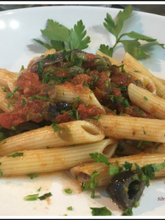 Una foto de Penne rigate alla puttanesca