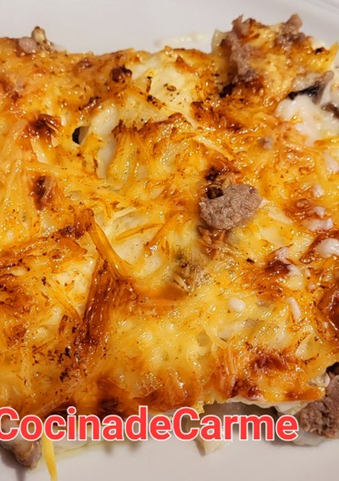Una foto de Canelones de carne y champiñones