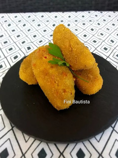 Una foto de Croquetas de berenjena queso y pimiento de piquillo