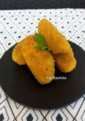 Una foto de Croquetas de berenjena queso y pimiento de piquillo