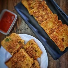 Bread besan toast A picture of Bread besan toast.