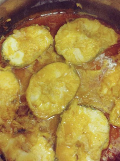 Una foto de Merluza al Curry
