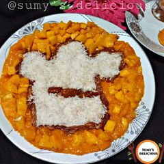 A picture of Date,coconut,mango,mango salat.