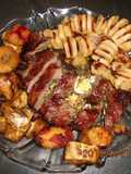 Colita rellena con papas carpincho y batatas