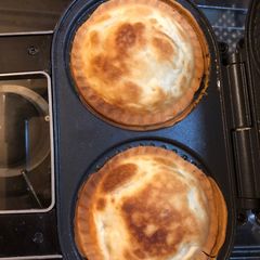A picture of Cheesy leek and potato pies.