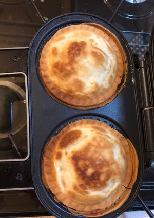 A picture of Cheesy leek and potato pies.