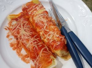 Una foto de Canelones de carne y jamón y mozzarella