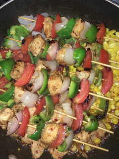 A picture of Chicken Shashlik with Garlic Rice.