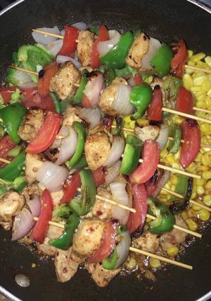 A picture of Chicken Shashlik with Garlic Rice.