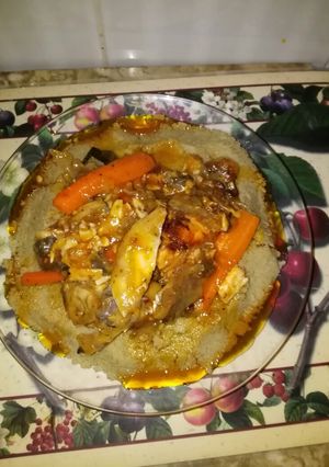 Foto principal de Cuscus de millo con cabeza de salmón