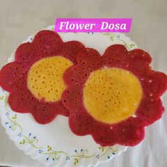 A picture of Beetroot & Carrot dosa.
