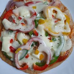 A picture of Thin Crust Paneer Pizza.