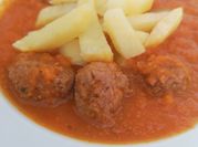 Una foto de salsa de naranja para carnes