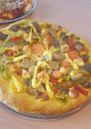 Une photo de Pizza