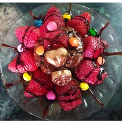 A picture of Fudgy Brownie with strawberry.