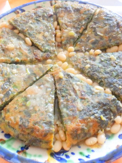 Una foto de Suquet de tortilla de espinacas