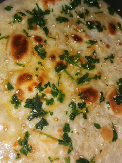 A picture of Garlic Naan bread.