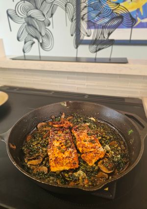 A picture of Salmon spinach mushroom bake.
