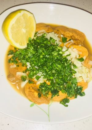Una foto de Erizos con salsa verde
