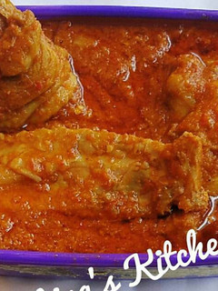 A picture of Tomato chicken stew.
