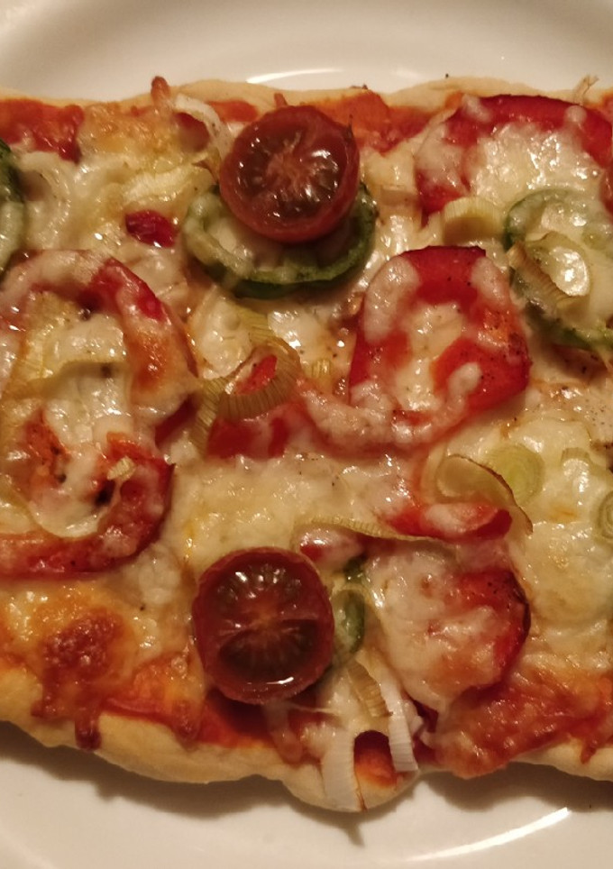 Una foto de Pizza de verduras