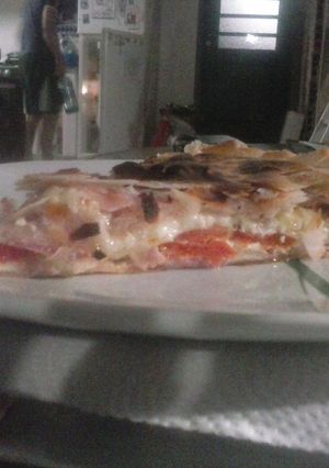 Una foto de Tarta de Jamón,queso, cebolla y tomate
