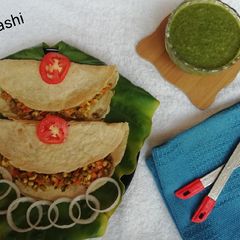 A picture of Urad dal oats dosa with sprouts filling.