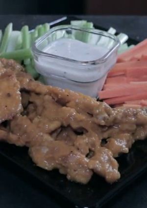 Una foto de Tiritas de pollo mango - habanero
