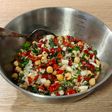 Ensalada del día, con bacalao ahumado, garbanzos y piquillo