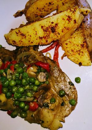 Una foto de Papas al merkén (acompañamiento chuletas)