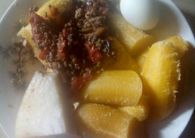 Boiled plantain,boiled yam,boiled egg and sauce